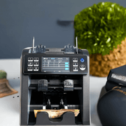 mixed note counting machine on cash up desk