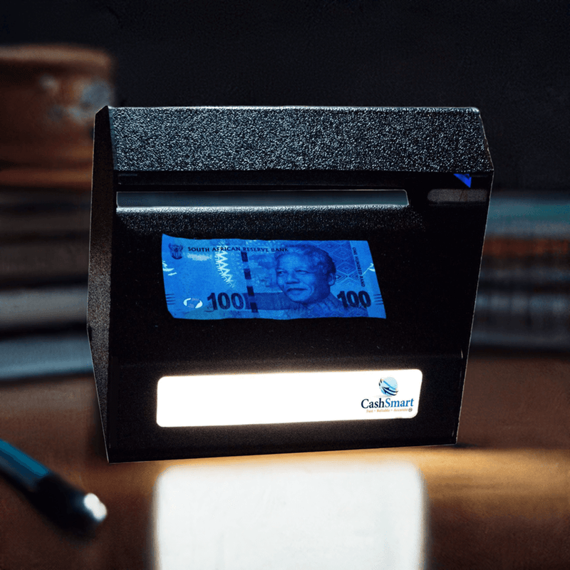 UV and white light counterfeit detector