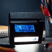 UV and white light counterfeit detector