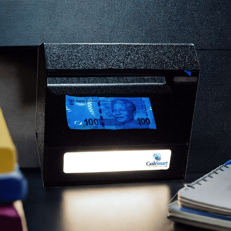 UV and white light counterfeit detector